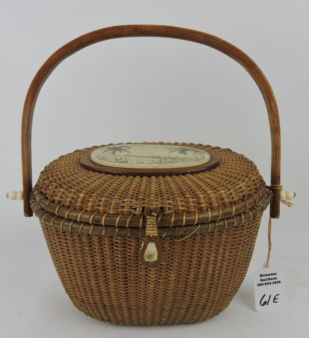 Nantucket basket lady: in bottom dated 1988, signed; AND a wicker basket with pelican painted lid