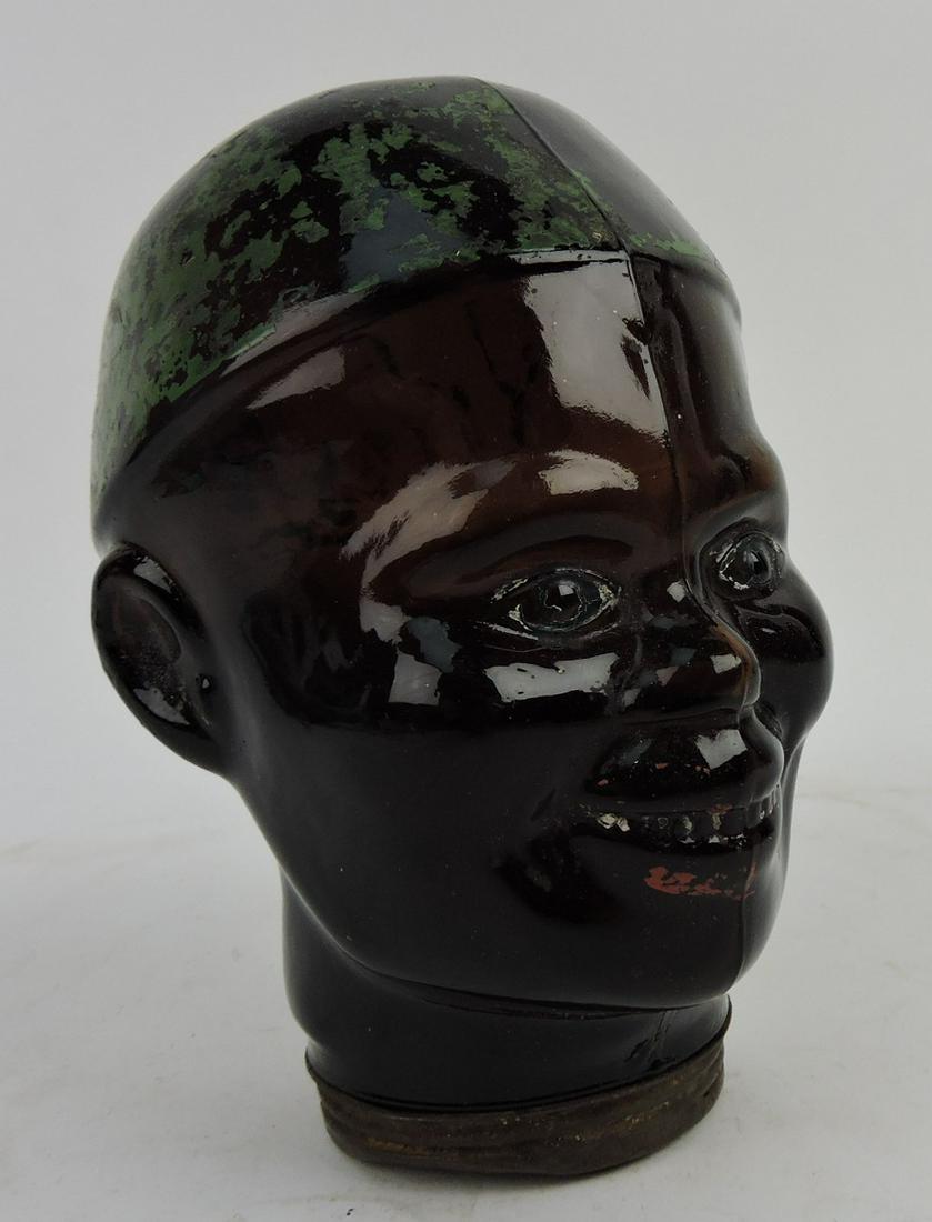Black Americana brown glass face jar,: 6 1/2"