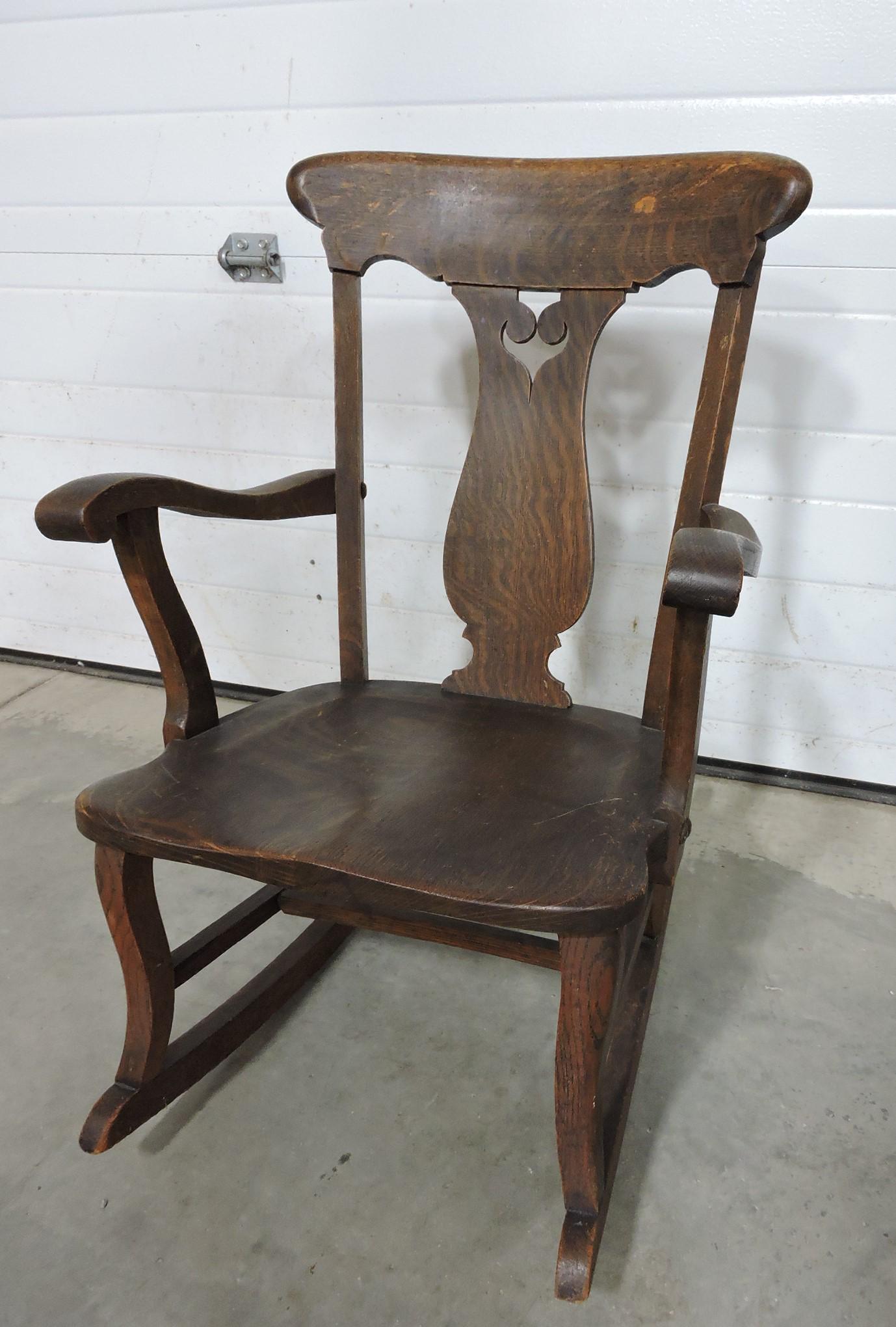 Oak child's arm rocker: .