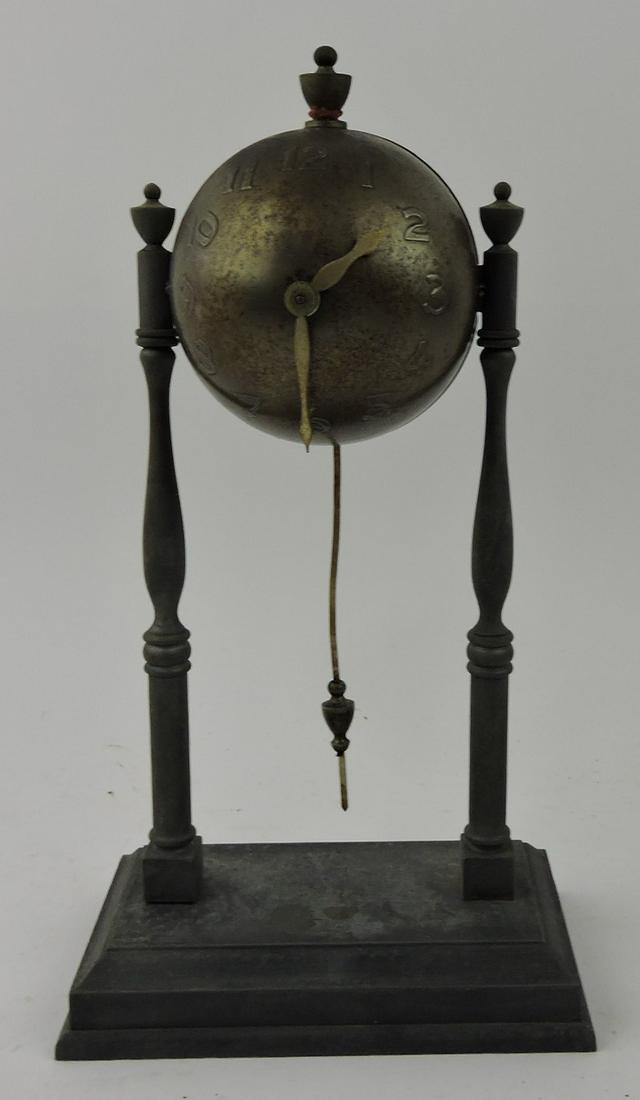 Small globe wind up clock, 10": .