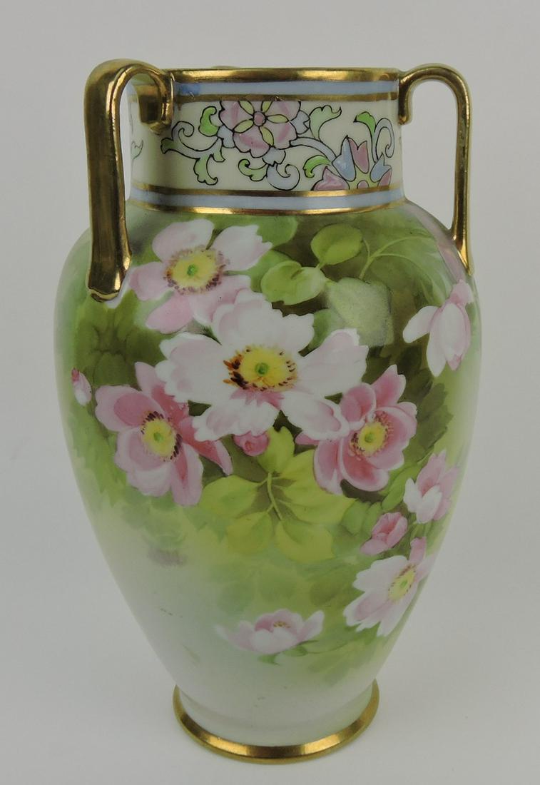 Nippon tri-handled vase with floral motif,: 11"