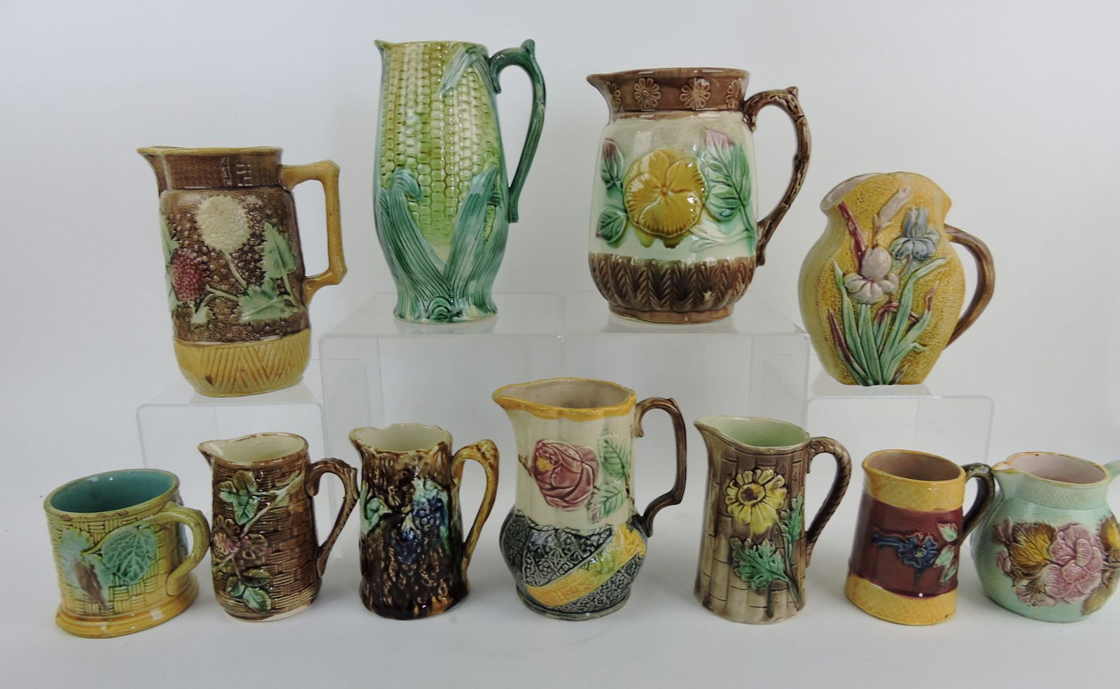 Majolica lot of 10 pitchers and 1 mug, (1 of 1)