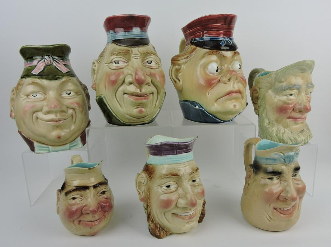 French majolica lot of 7 face jugs, (1 of 1)