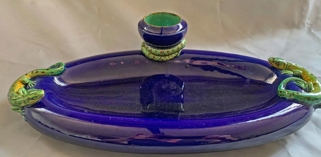 Minton majolica lizards inkstand in: palissy style, the rim with two lizards and a coiled snake supporting the inkwell on cobalt ground, date code 1859, 14"