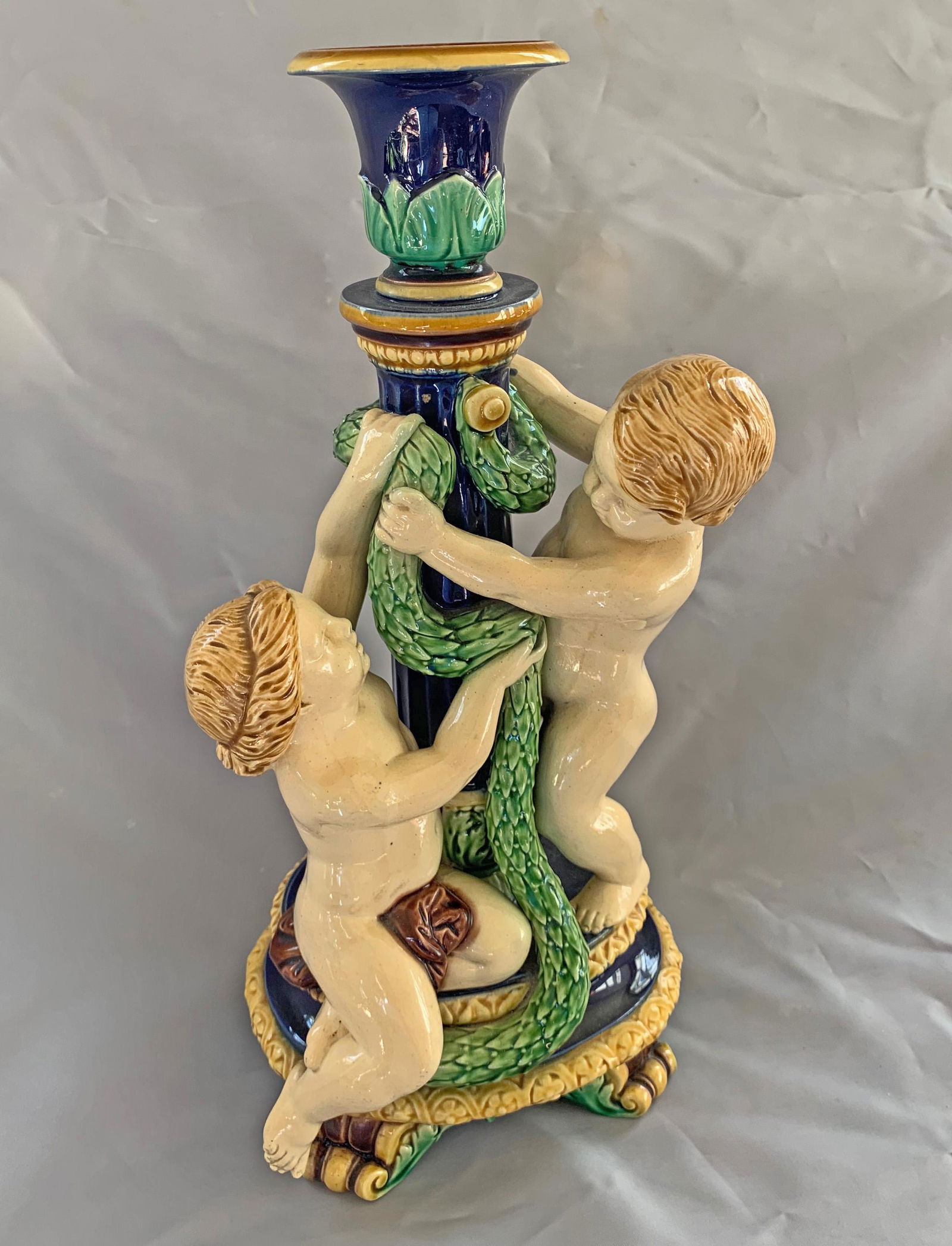 Minton majolica putti candlestick (1 of 3)