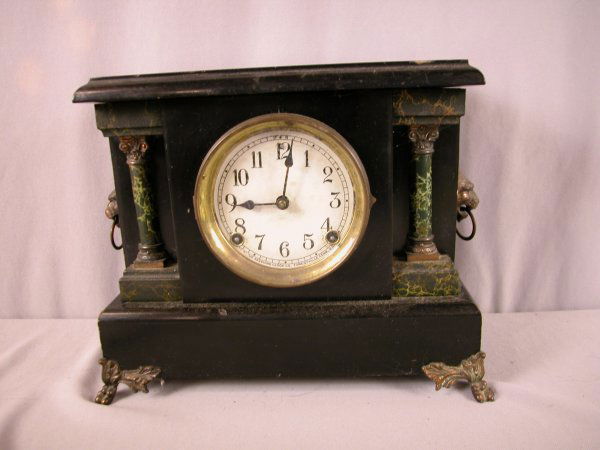 Sessions black mantle clock with lion head handles: Sessions black mantle clock with lion head handles