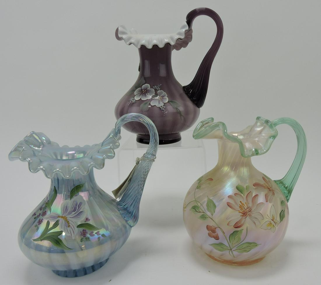 Fenton lot of 3 pitchers with floral decor (1 of 1)