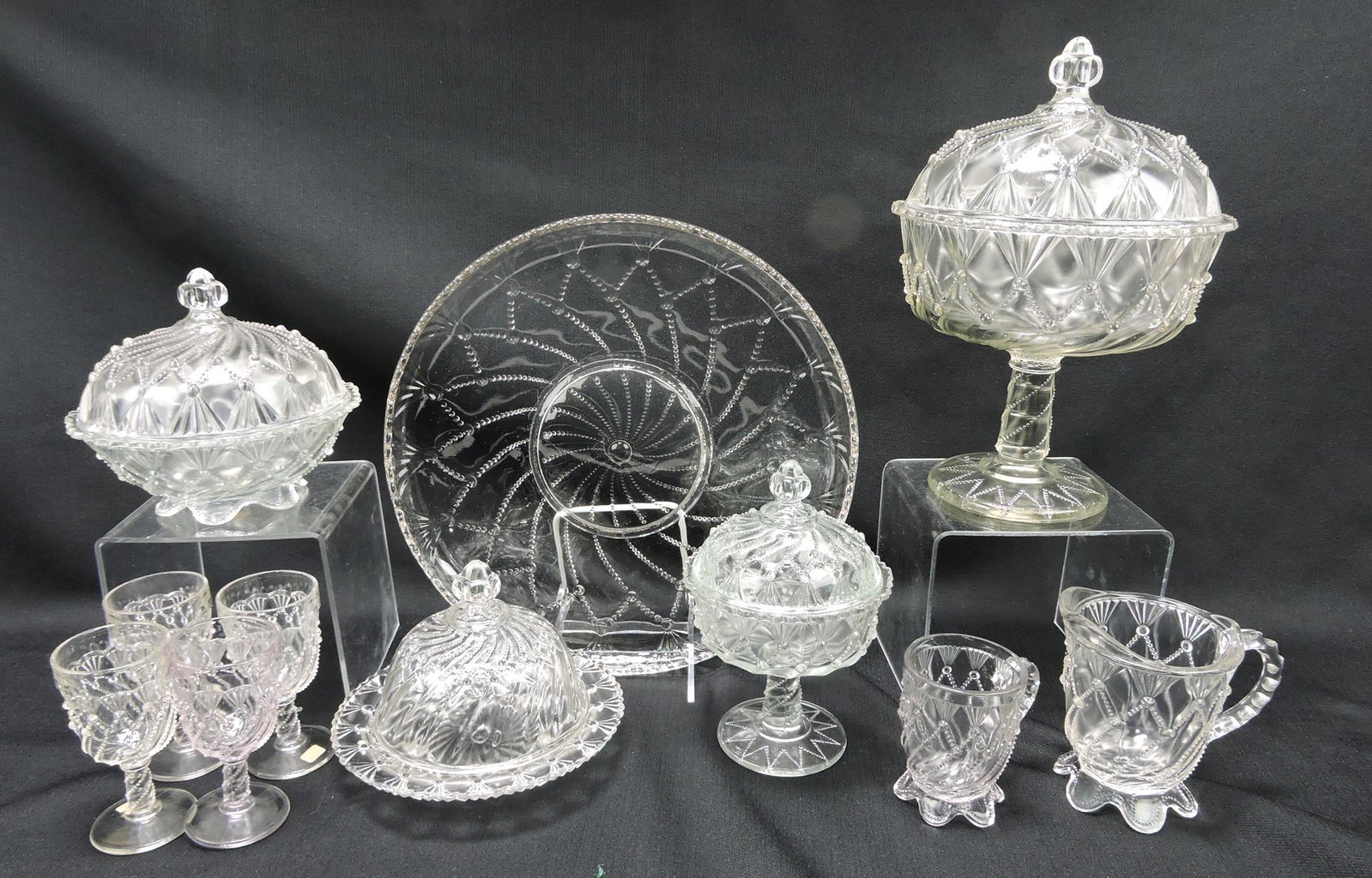 Greentown Cord Drapery clear EAPG lot of: 11 pieces: 2 butter, 4 wine goblets, 11 3/4" tray, covered candy, covered compote, mug, creamer