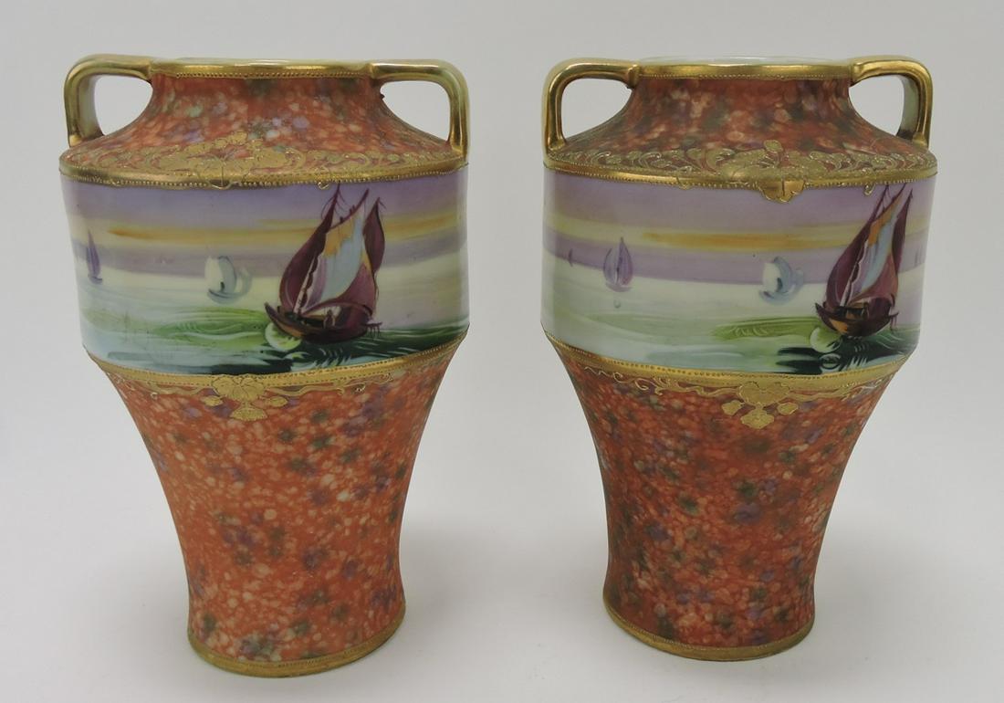 Nippon pair of 8" vases with sailboat scene: .