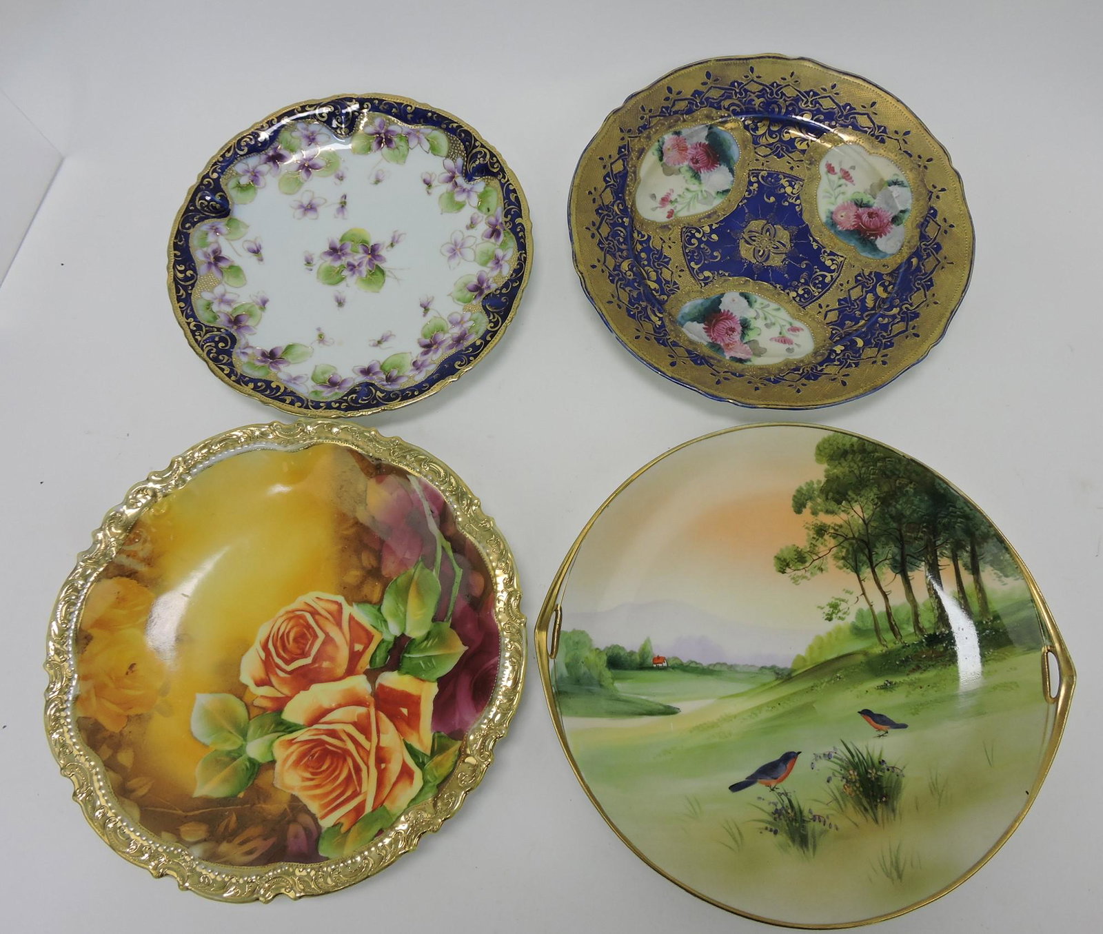 Nippon lot of 4 plates, 9 to 11": .
