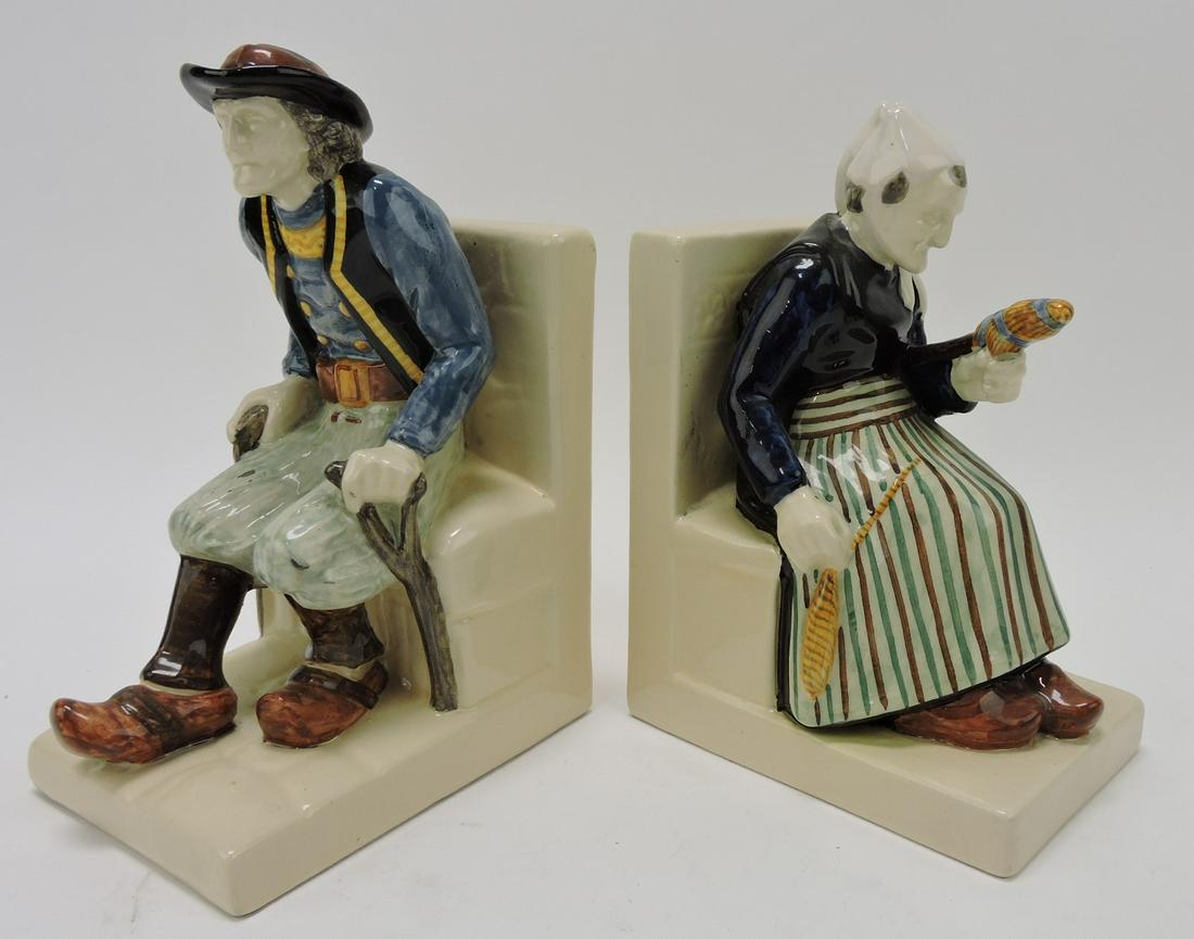 Henriot Quimper pair of bookends with: man and woman on chair