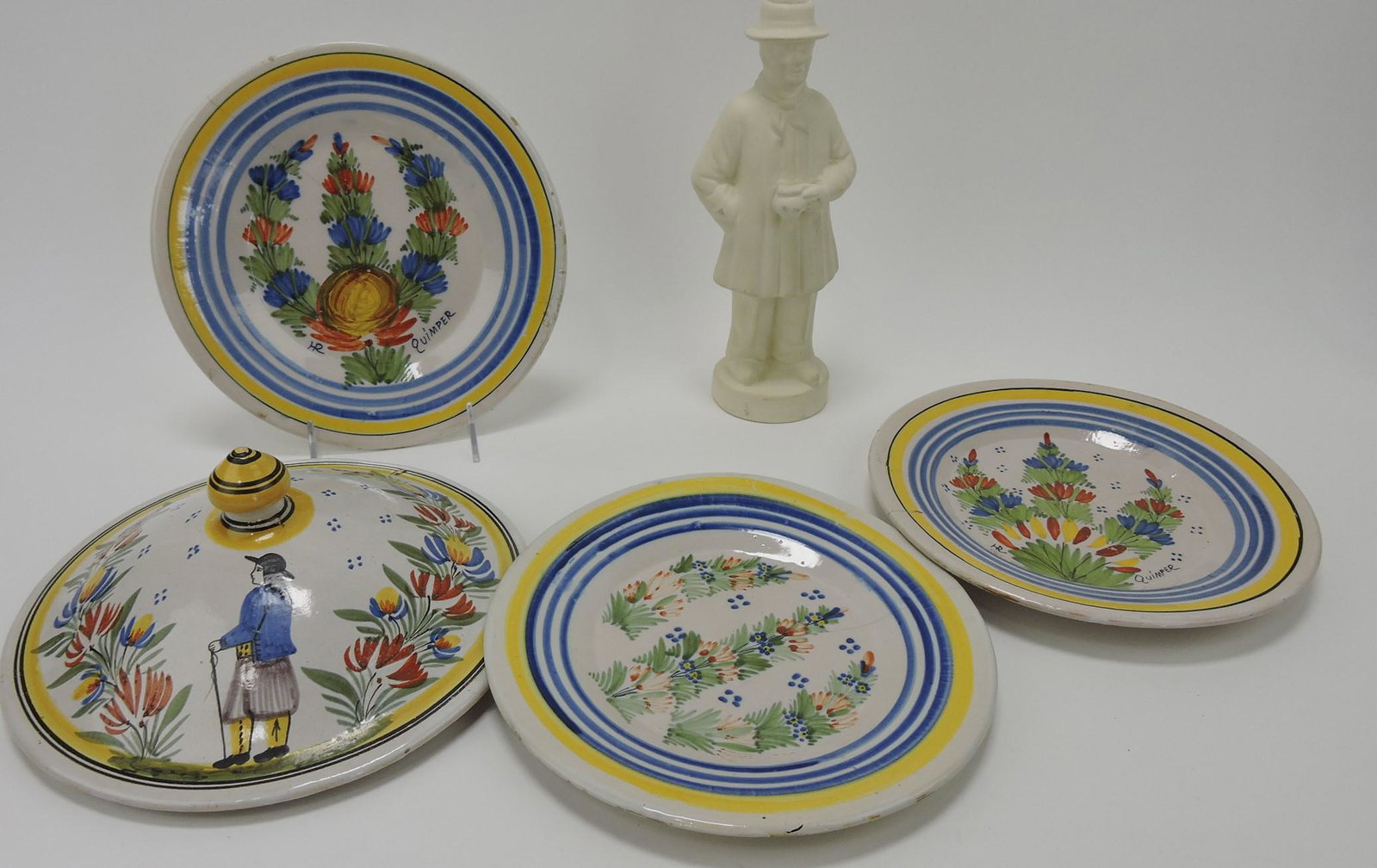 Henriot Quimper lot of 3 plates, tureen: lid, and Normandy unglazed candle stick; various condition