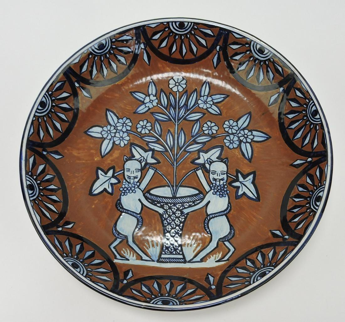 Henriot Quimper magnificent charger: from 1920's-30's with African motif, created at the time of the French Colonial Exposition of 1931, 15"