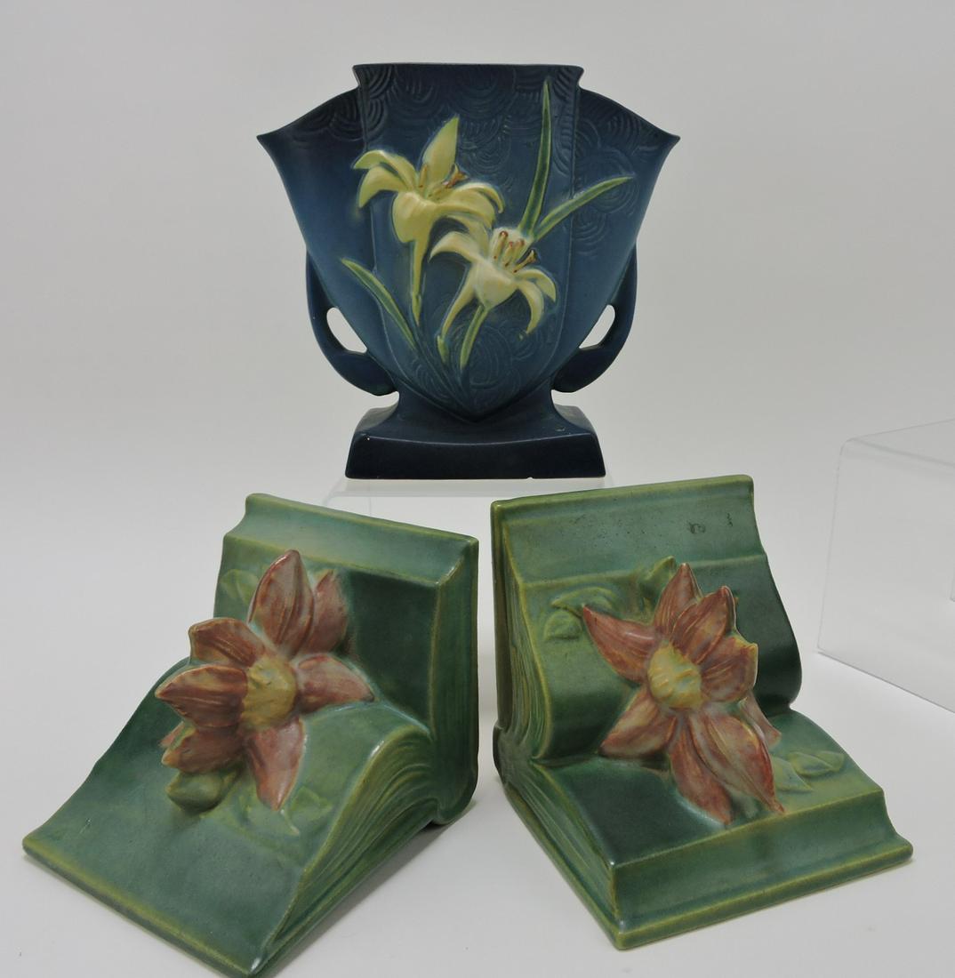 Roseville pair of bookend (nick) and: vase (nick)