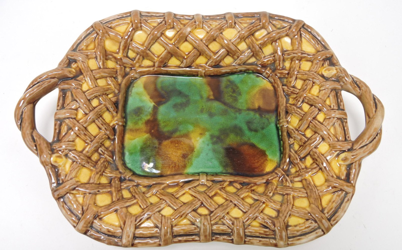 Majolica wicker tray, 12 1/2", professional: rim repair