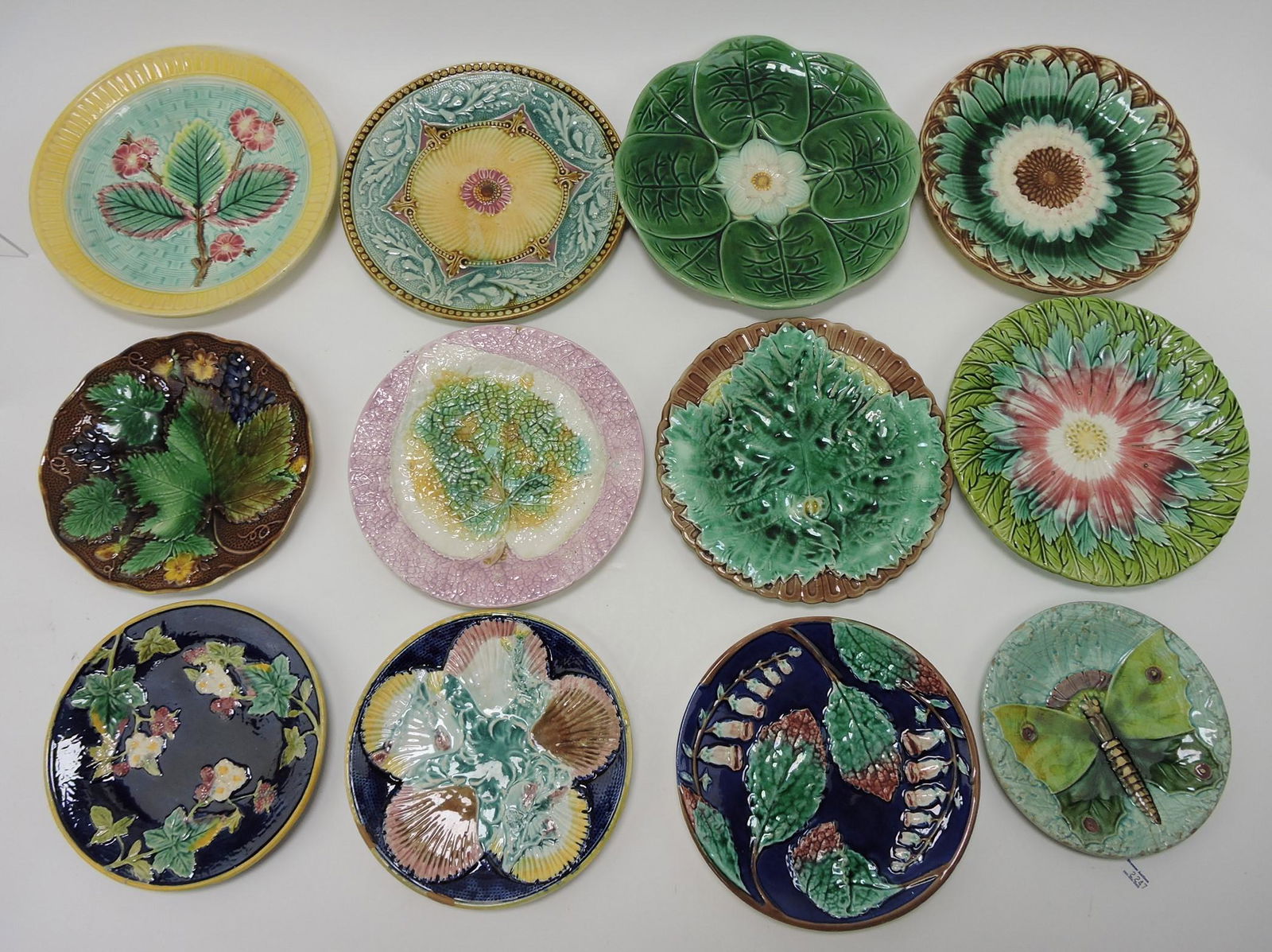 Majolica lot of 12 plates, various condition (1 of 1)