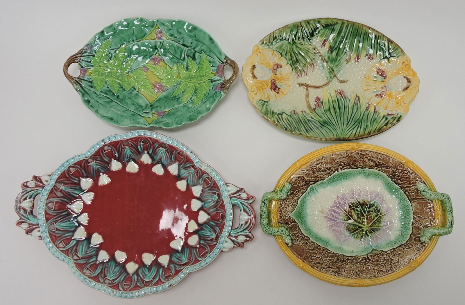 Majolica lot of 4 platters: .