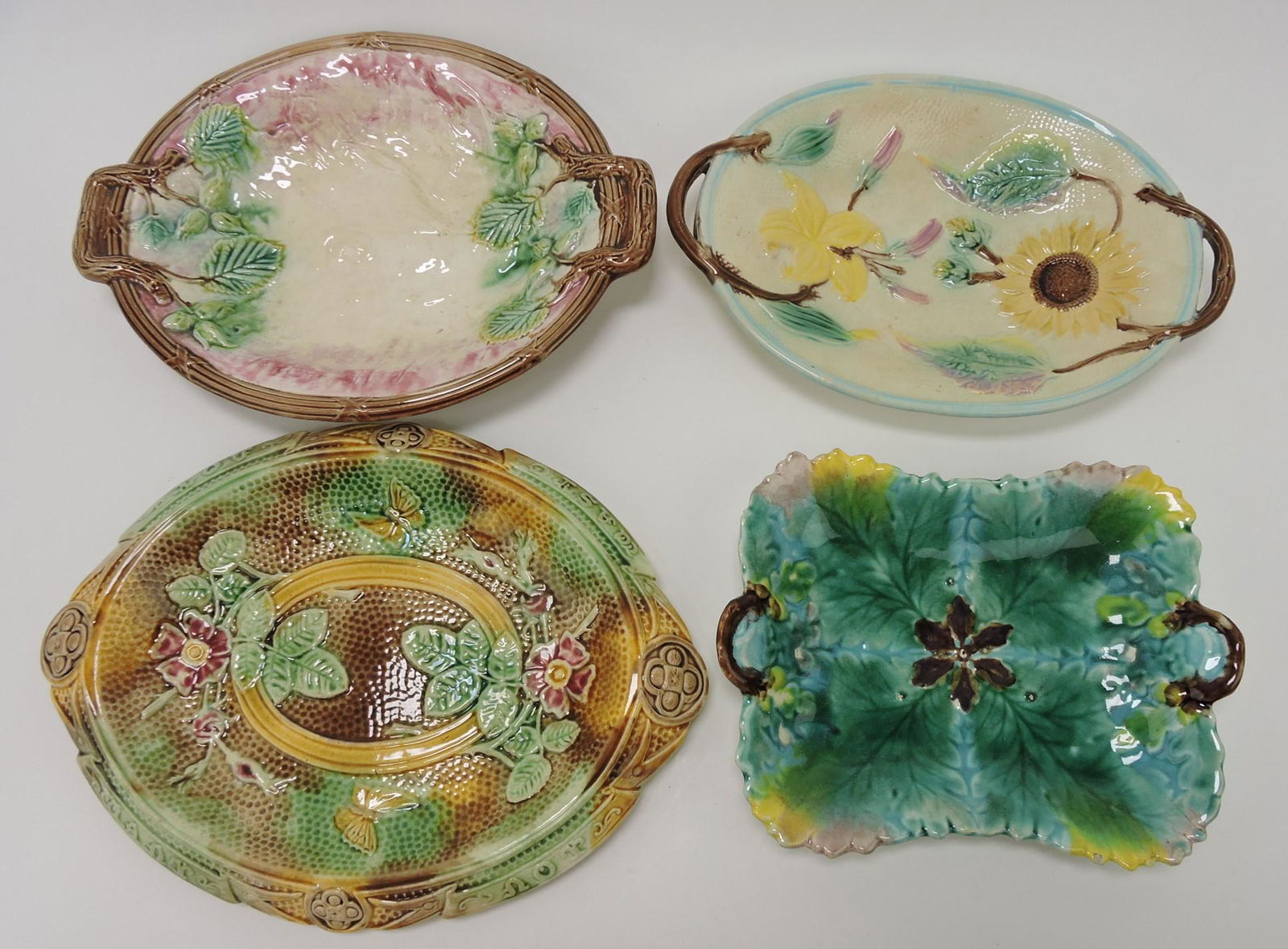 Majolica lot of 4 platters: .