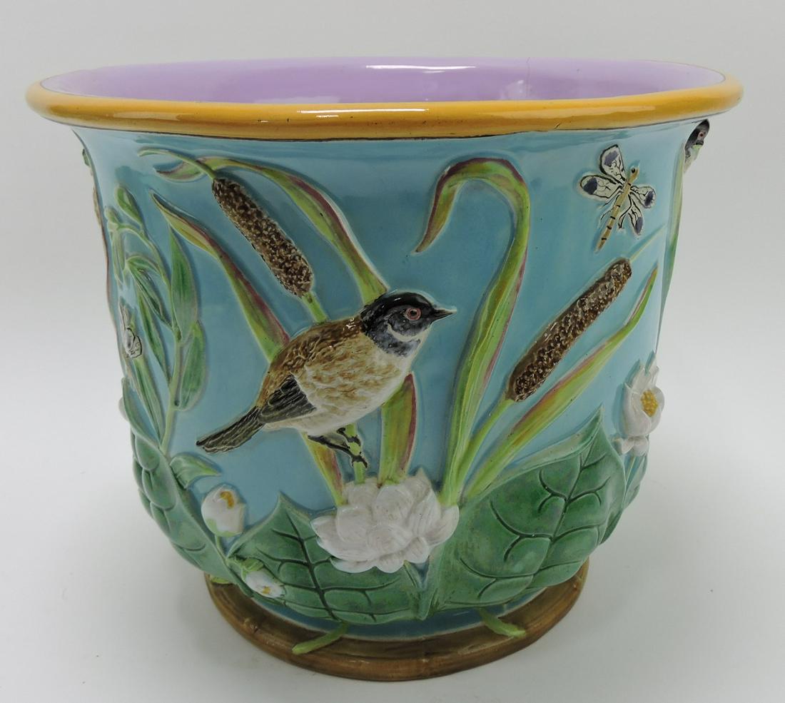 George Jones majolica bird, dragonfly,: and bullrush jardiniere, 11 1/2"h, 13 1/2"w; hairline, 2 early staple repairs