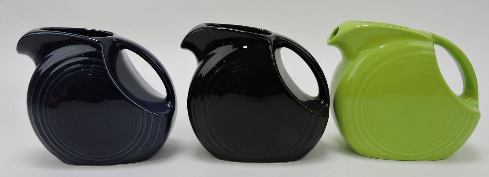 Fiesta Post 86 lot of 3 disc juice pitchers (1 of 1)