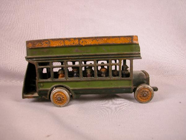 Cast iron double decker bus with passengers, loss of: Cast iron double decker bus with passengers, loss of rear step, 9"