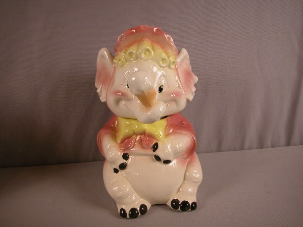 Brush pink baby elephant with ice cream cone cook: Brush pink baby elephant with ice cream cone cookie jar