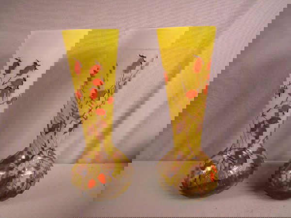 Daum Nancy pair of yellow French cameo vases with: Daum Nancy pair of yellow French cameo vases with floral motif, 12", nice, very small rim nick to top rim of one vase