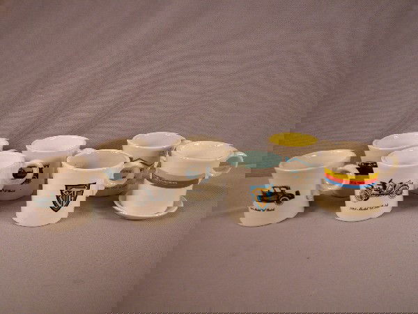 Fiesta lot of 4 car mugs and 3 advertising mugs, on: Fiesta lot of 4 car mugs and 3 advertising mugs, one with coaster