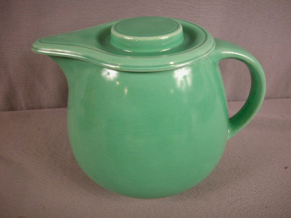 Fiesta Kitchen Kraft green covered jug, nick to li: Fiesta Kitchen Kraft green covered jug, nick to lid
