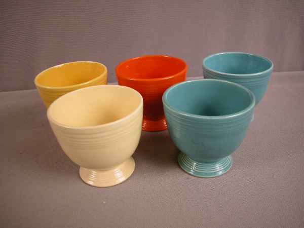 Fiesta egg cup group - yellow, red, ivory and 2 t: Fiesta egg cup group - yellow, red, ivory and 2 turquoise (hairline to one turquoise)