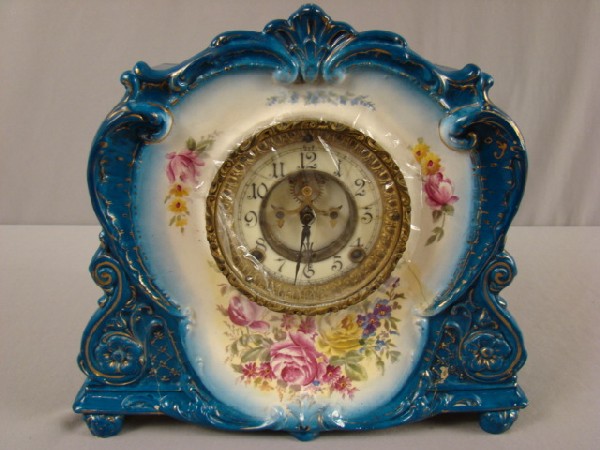 Ansonia German Royal Bonn porcelain LaMarne clock, : Ansonia German Royal Bonn porcelain LaMarne clock, 12"h, hairline to case, missing glass