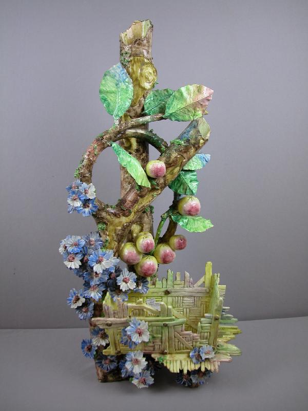 French elaborate floor vase with basket in tree : French elaborate floor vase with basket in tree with applied flowers and leaves, chips and repairs to high points, unusual design, 32"h