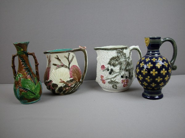 Majolica group of 4 pieces - Minton cobalt jug, : Majolica group of 4 pieces - Minton cobalt jug, 2 Wedgwood pitchers and a Brownfield vase, hairlines and/or repairs