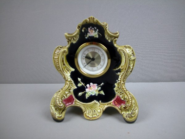 European majolica clock with cobalt ground, rim c: European majolica clock with cobalt ground, rim chip, 7", Mercedes West German clock works replaced