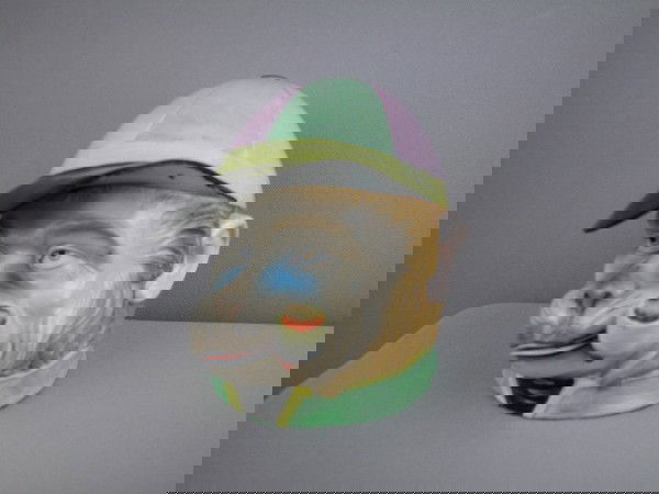 Porcelain monkey jockey with pipe figural humidor: Porcelain monkey jockey with pipe figural humidor