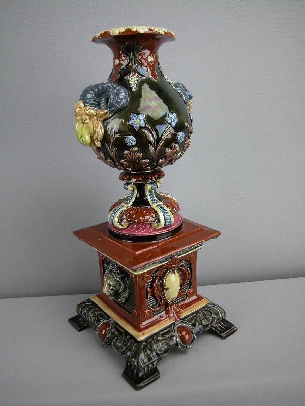 HUGO LONITZ majolica mantle urn with rams head: HUGO LONITZ majolica mantle urn with rams head handles and lion masks, shape no. 1665, professional repair to square corners, 12 1/2"