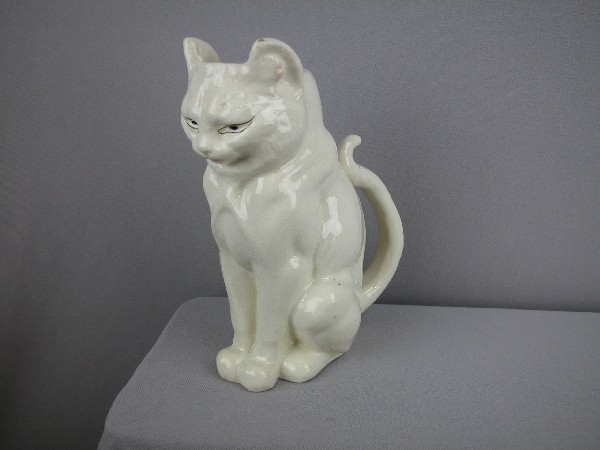 Dreyfus figural white cat pitcher, 9", minor gl: Dreyfus figural white cat pitcher, 9", minor glaze rub to tip of ears, minor hairline , 9"