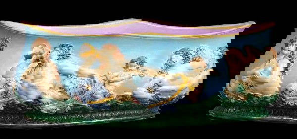 GEORGE JONES monumental majolica oval jardinier: GEORGE JONES monumental majolica oval jardiniere with mermaids and mermen riding dolphins at sea, great color and detail, 22"l, 8"h