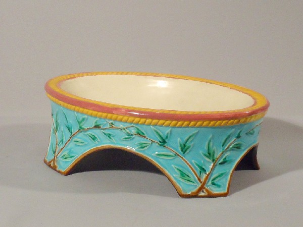 GEORGE JONES majolica oval dog bowl with turquoi: GEORGE JONES majolica oval dog bowl with turquoise ground and ivy, 9 3/4"l