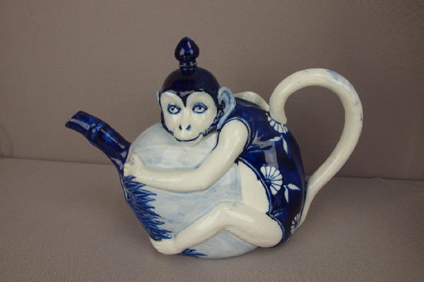 MINTON blue and white figural teapot in the form : MINTON blue and white figural teapot in the form of a monkey grasping a coconut, rare to find in blue & white, 9"l