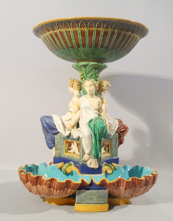 MINTON majolica very rare table center with a t: MINTON majolica very rare table center with a tri-foil shell base supporting three maidens under a large bowl, very rare form, shape no. 1337 , 13 1/2", professional repair to shells at base and to bo