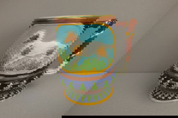 GEORGE JONES hunt mug with fox and rabbit on one: GEORGE JONES hunt mug with fox and rabbit on one side and hunting dog with quail on the other, 6"h, minor hairline