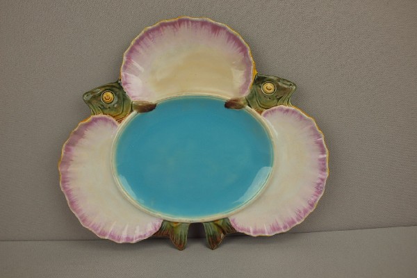 MINTON majolica seafood plate in the form of two: MINTON majolica seafood plate in the form of two fish in 3 shells with turquoise center, 10", shape no. 1497, professional repair to rim
