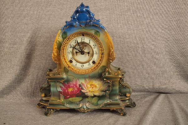 Royal Bonn china clock with Ansonia open escapement: Royal Bonn china clock with Ansonia open escapement clock works