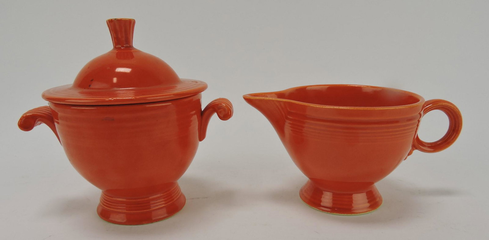 Fiesta cream & sugar, red, nick to: finial