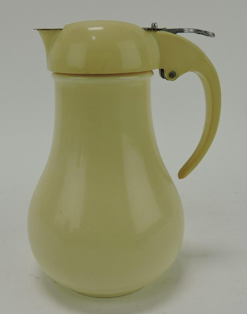Fiesta syrup pitcher, ivory (1 of 1)