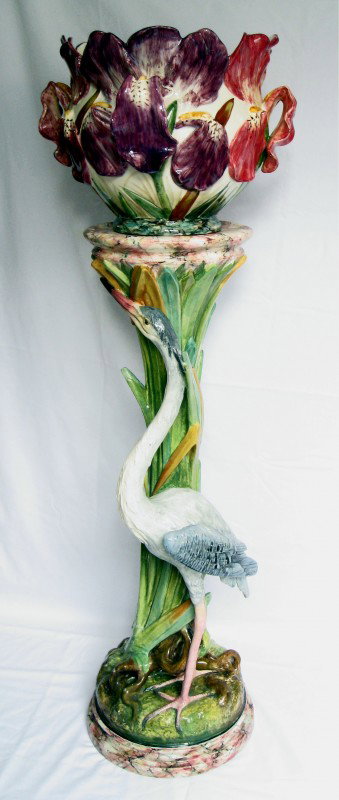 DELPHIN MASSIER monumental French majolica jardin: DELPHIN MASSIER monumental French majolica jardiniere and pedestal applied with heron in front of bullrushes, 49"h, outstanding color and detail, loss of 2 leaf tips, minor glaze rubs and professional