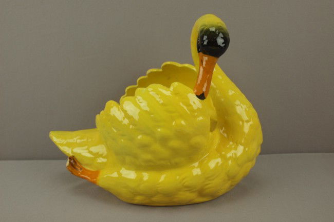JEROME MASSIER yellow swan form planter, 10"h, 13: JEROME MASSIER yellow swan form planter, 10"h, 13"l, chip to foot