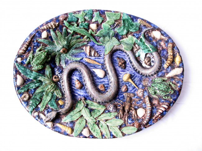 RARE monumental French Palissy Ware platter applie: RARE monumental French Palissy Ware platter applied with a large snake with two frogs, crayfish and a lizard on a profusion of leaves and shells, probably 17th century, 22 1/2"l, a rare opportunity