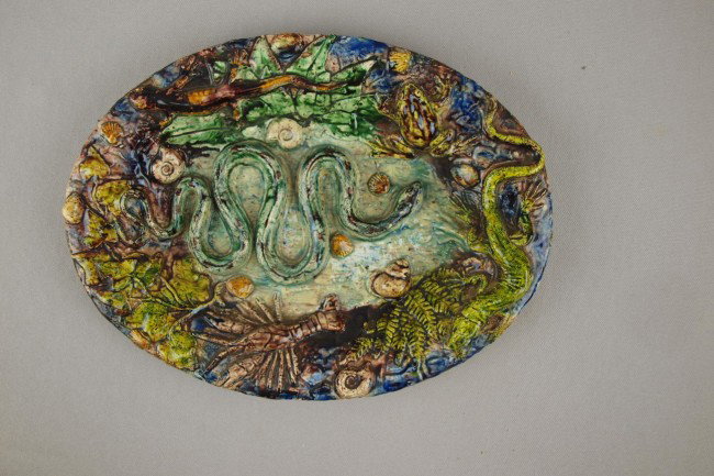 French Palissy Ware oval plaque attributed to Jose: French Palissy Ware oval plaque attributed to Joseph Landis with snake, frog, lizard, salamander and other sealife, chip to snail, 12" x 9"